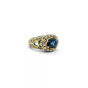 Blue topaz heart ring with diamond and amethyst set in 22ct gold S588